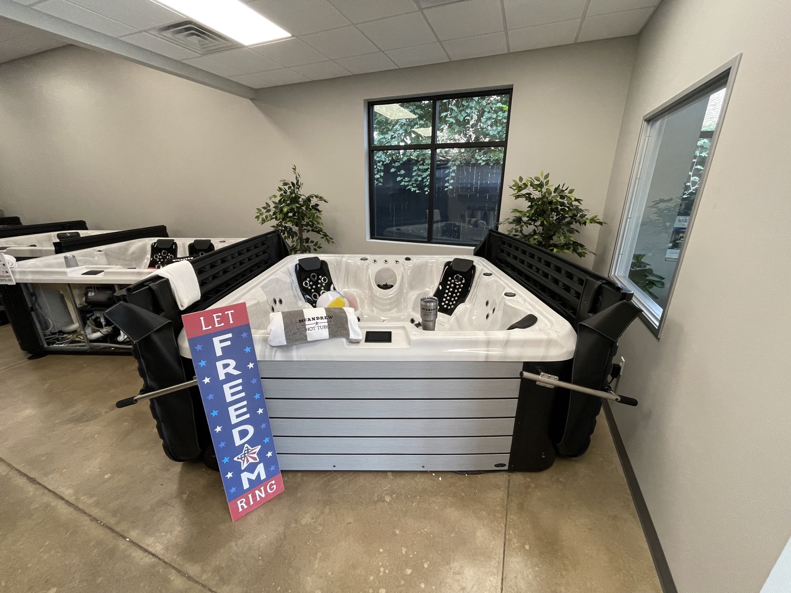 Hot tubs on the McAndrew Hot Tubs showroom floor in Arlington, TX